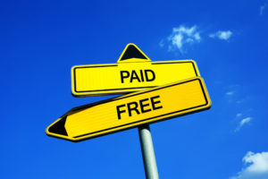 sign that says paid or free