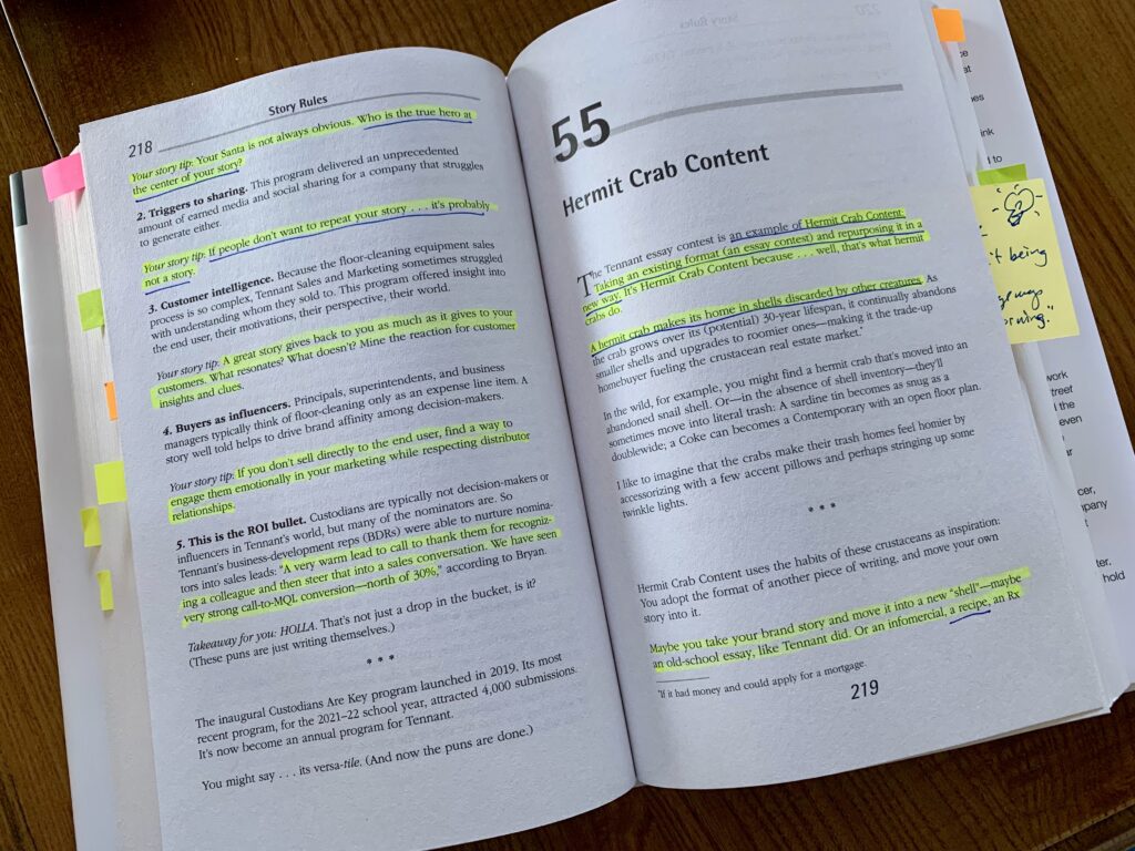 Everybody writes -Printed book with yellow highlights, notes and flags.